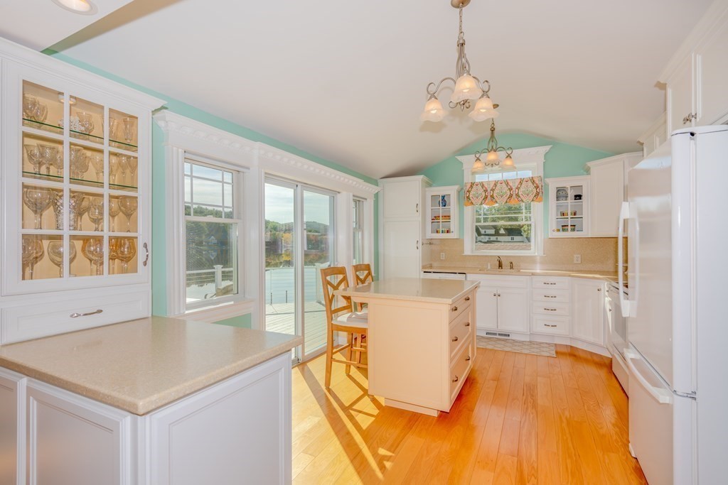 23 Craig Road Holland, MA 01521 - Photo 7 of 40 a view of a dining room with furniture a chandelier and wooden floor