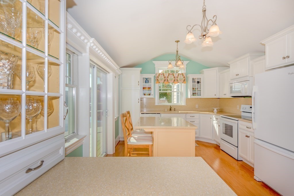 23 Craig Road Holland, MA 01521 - Photo 8 of 40 a large white kitchen with a large window