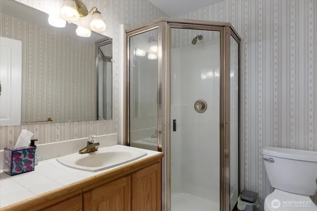 a workspace with furniture and window