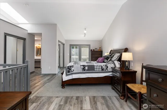 a room with a dresser and a window