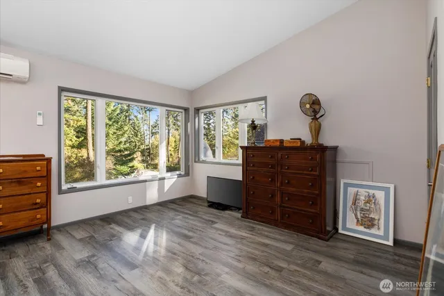 a view of entryway with wooden floor