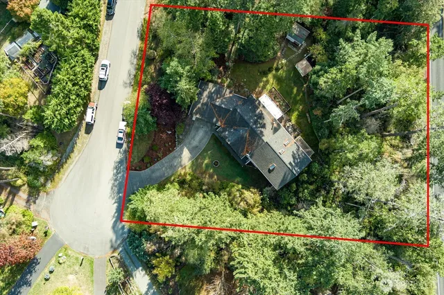 a view of a lake with a lawn chair