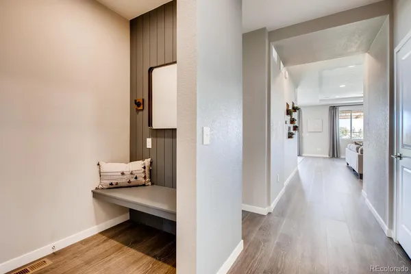 a bathroom with a sink a toilet and a window