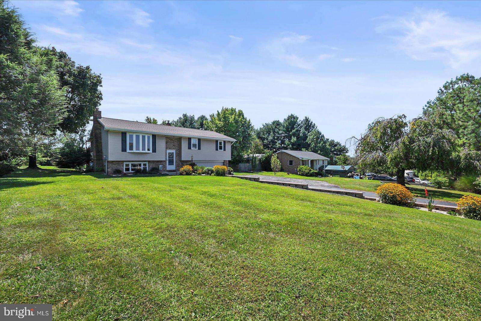 253 Kindig Road Littlestown, PA 17340 - Photo 2 of 41 Charming home on lush green grounds.