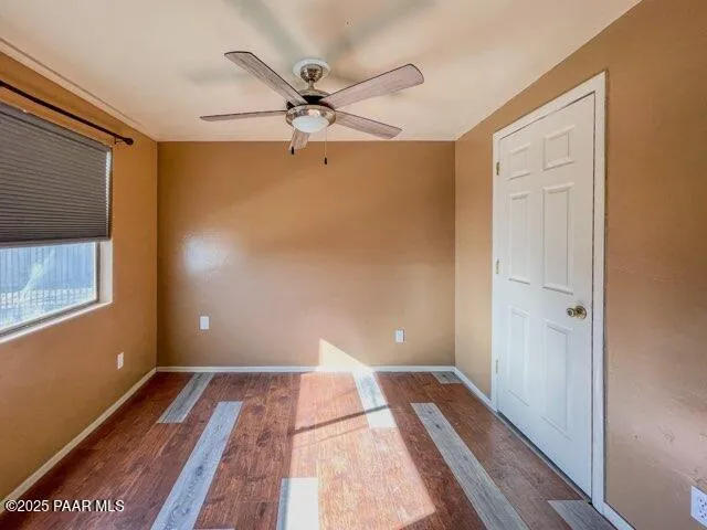 a bathroom with a granite countertop shower and a sink