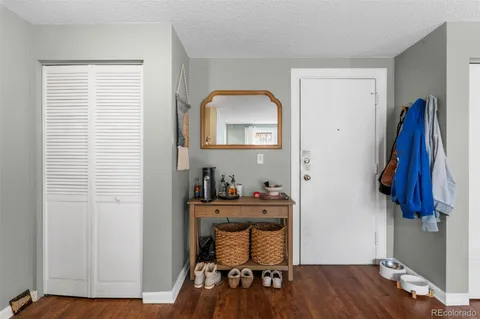 a workspace with furniture and wooden floor