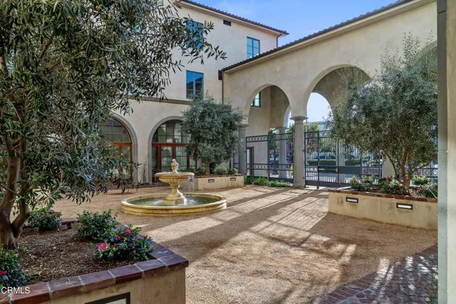 a large white kitchen with lots of counter top space