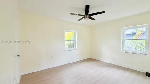 a kitchen with a refrigerator stove and sink