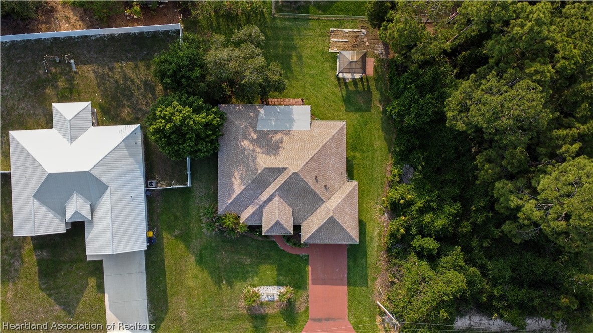 309 Lark Terrace Sebring, FL 33872 - Photo 29 of 32 an aerial view of a house