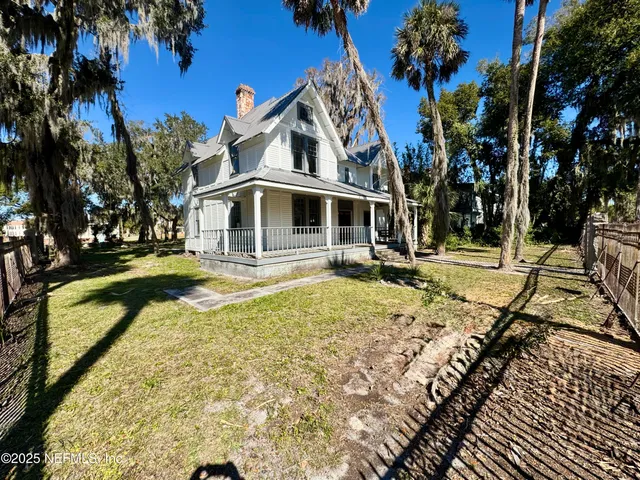 a front view of a house with swimming pool