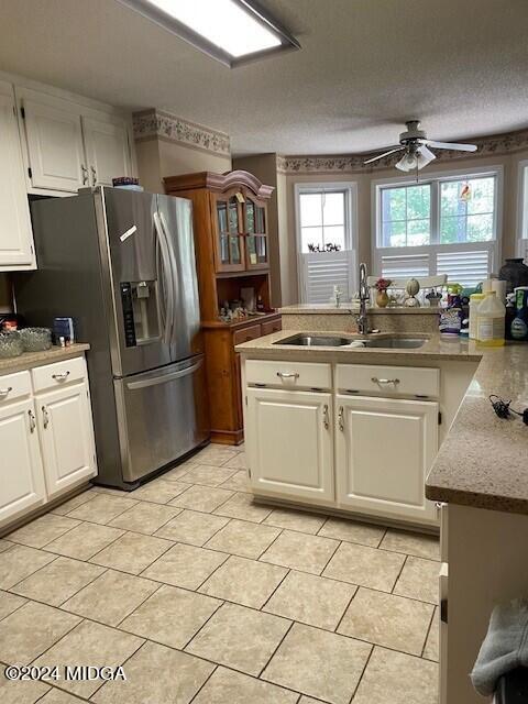 187 Bateman Lane Gray, GA 31032 - Photo 11 of 27 a kitchen with stainless steel appliances a stove a sink and a refrigerator
