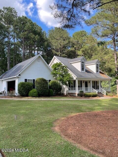 187 Bateman Lane Gray, GA 31032 - Photo 2 of 27 a front view of a house with a yard
