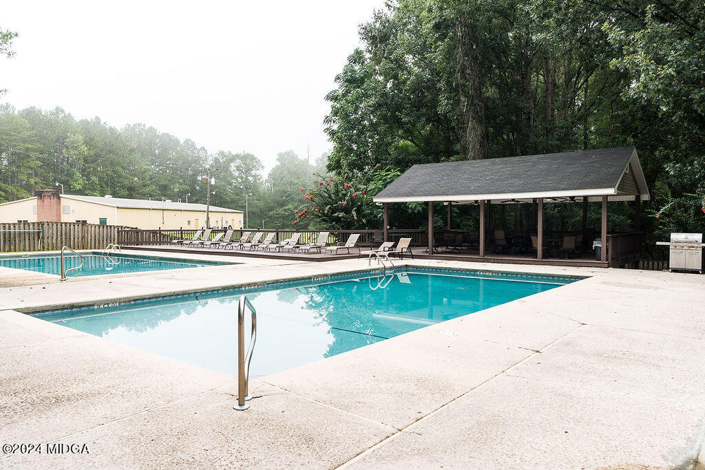 187 Bateman Lane Gray, GA 31032 - Photo 24 of 27 a view of swimming pool with chairs