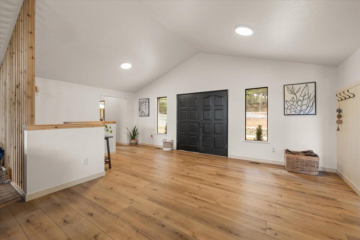 350 Splendor Drive Wilderville, OR 97543 - Photo 10 of 57 a view of empty room with wooden floor