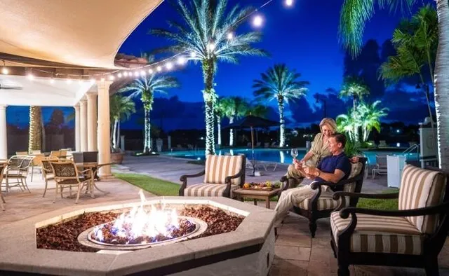 a childrens park with lots of swings and slides