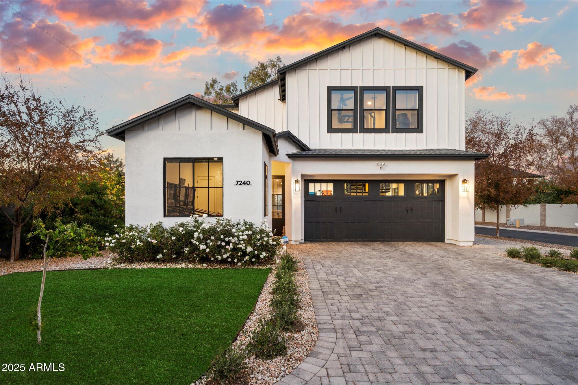 7240 North 13th Lane Phoenix, AZ 85021 - Photo 1 of 69 a front view of a house with a garden and yard