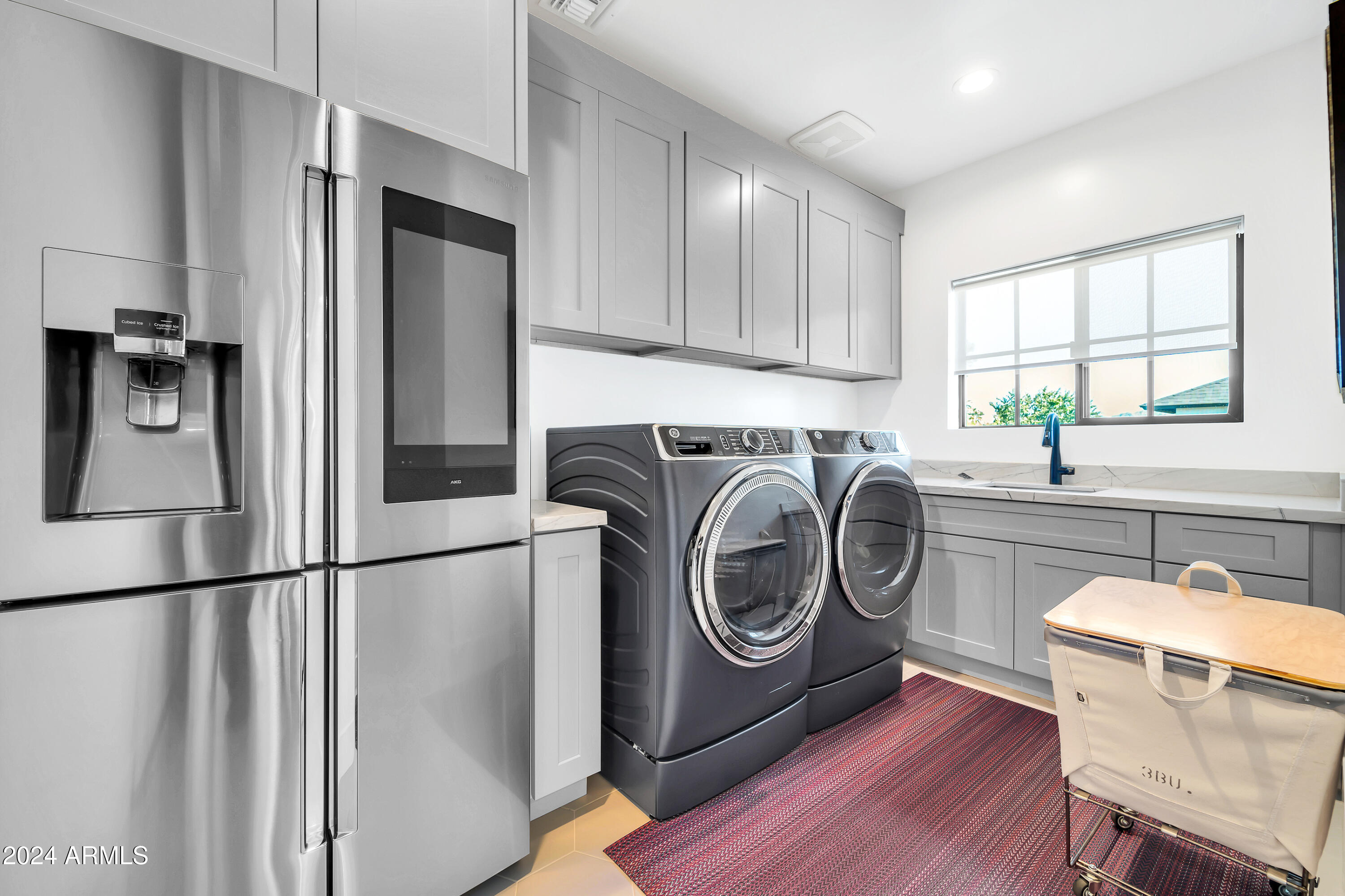 7240 North 13th Lane Phoenix, AZ 85021 - Photo 50 of 69 a utility room with sink dryer and washer