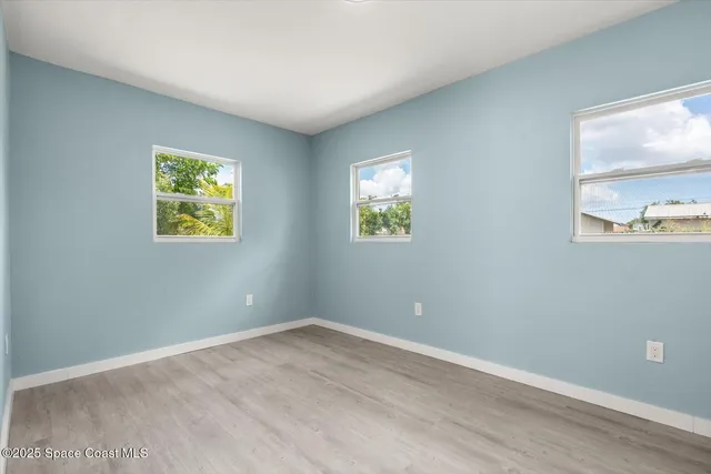 a view of room with window and workspace