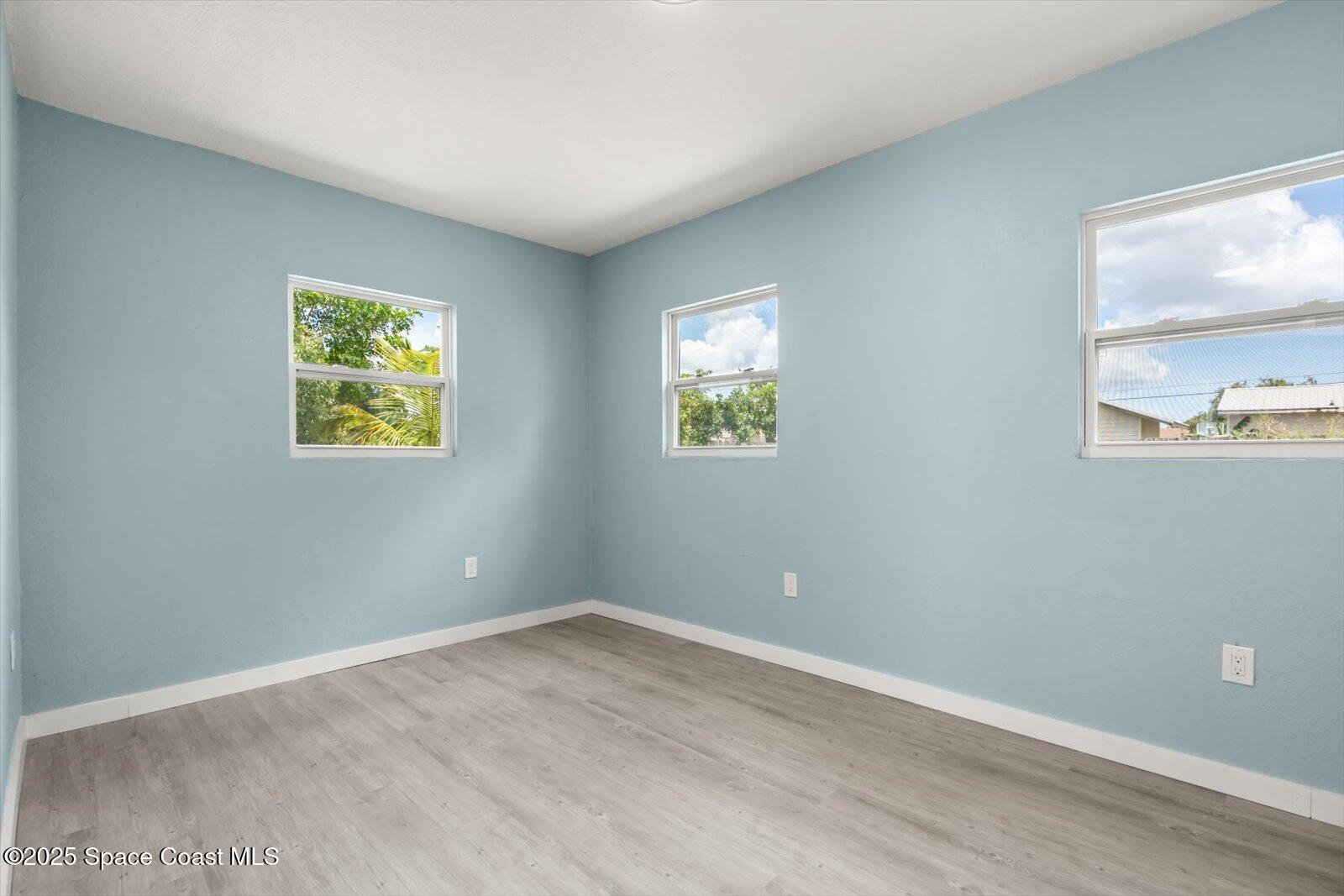 1436 Melrose Street Cocoa, FL 32922 - Photo 15 of 28 a view of room with window and workspace