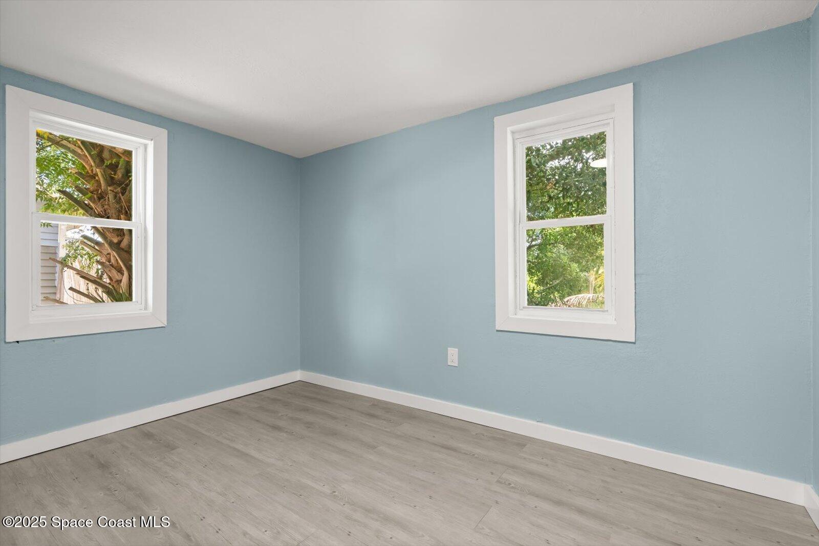 1436 Melrose Street Cocoa, FL 32922 - Photo 21 of 28 an empty room with a window