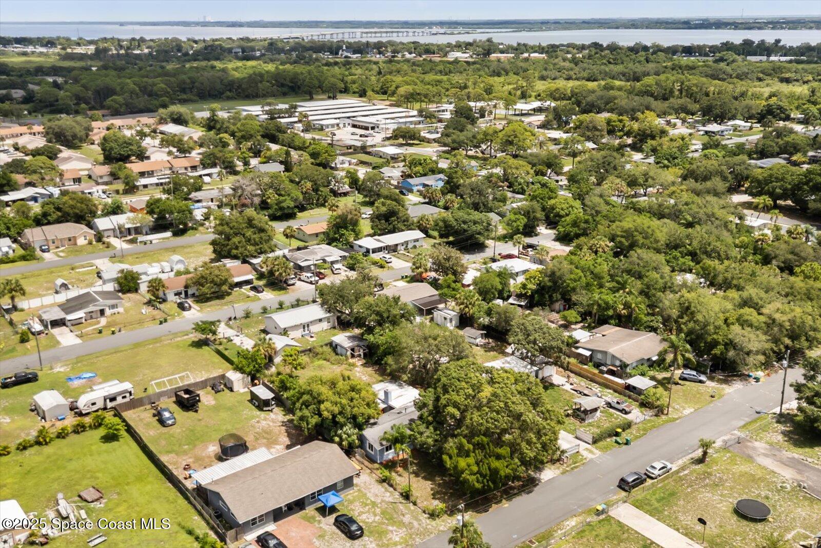 1436 Melrose Street Cocoa, FL 32922 - Photo 26 of 28 an aerial view of residential houses with outdoor space