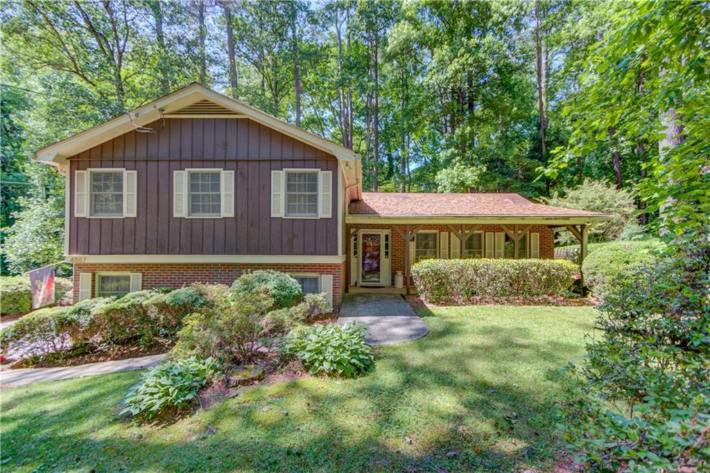 4557 Town Crier Road Southwest Lilburn, GA 30047 - Photo 1 of 1 Gallery Image 1