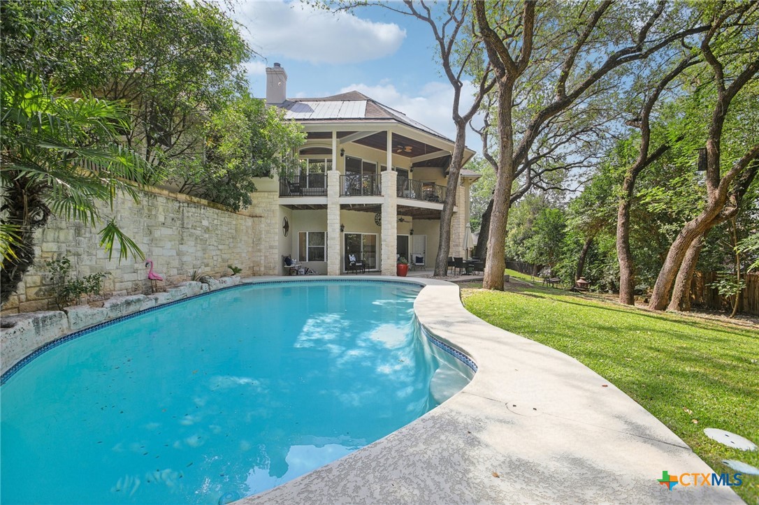 2302 Bahama Road Austin, TX 78733 - Photo 1 of 1 a view of a house with a yard