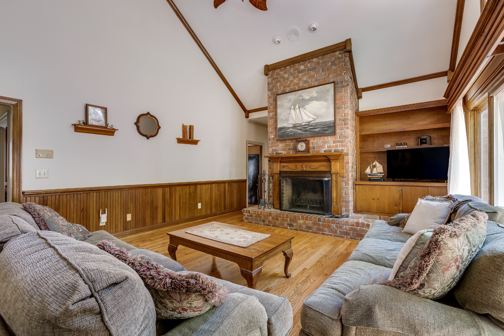 1111 Temple Ridge Court Nashville, TN 37221 - Photo 24 of 46 a living room with furniture fireplace and flat screen tv