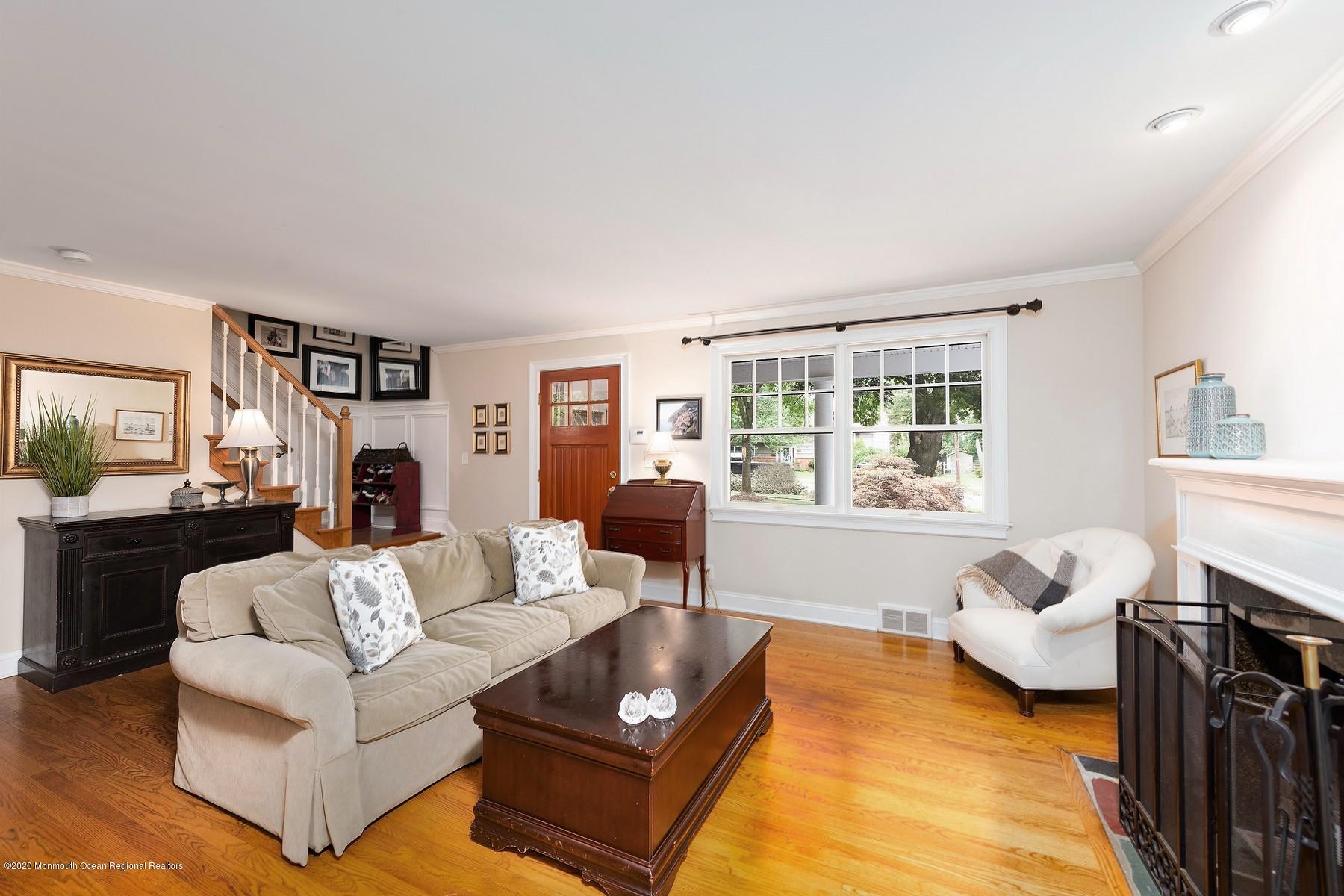 15 Harvard Road Fair Haven, NJ 07704 - Photo 3 of 26 Living Room w/ Cozy Fireplace