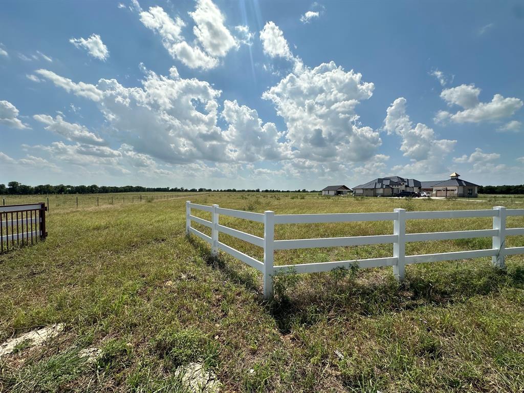 235 Sam Bass Road McGregor, TX 76657 - Photo 2 of 3 Gate with a view of rural / pastoral area