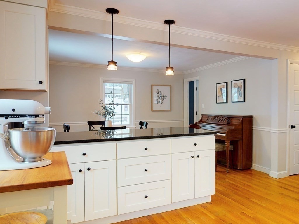 29 Baker Road Arlington, MA 02474 - Photo 16 of 36 a kitchen with cabinets a window and appliances