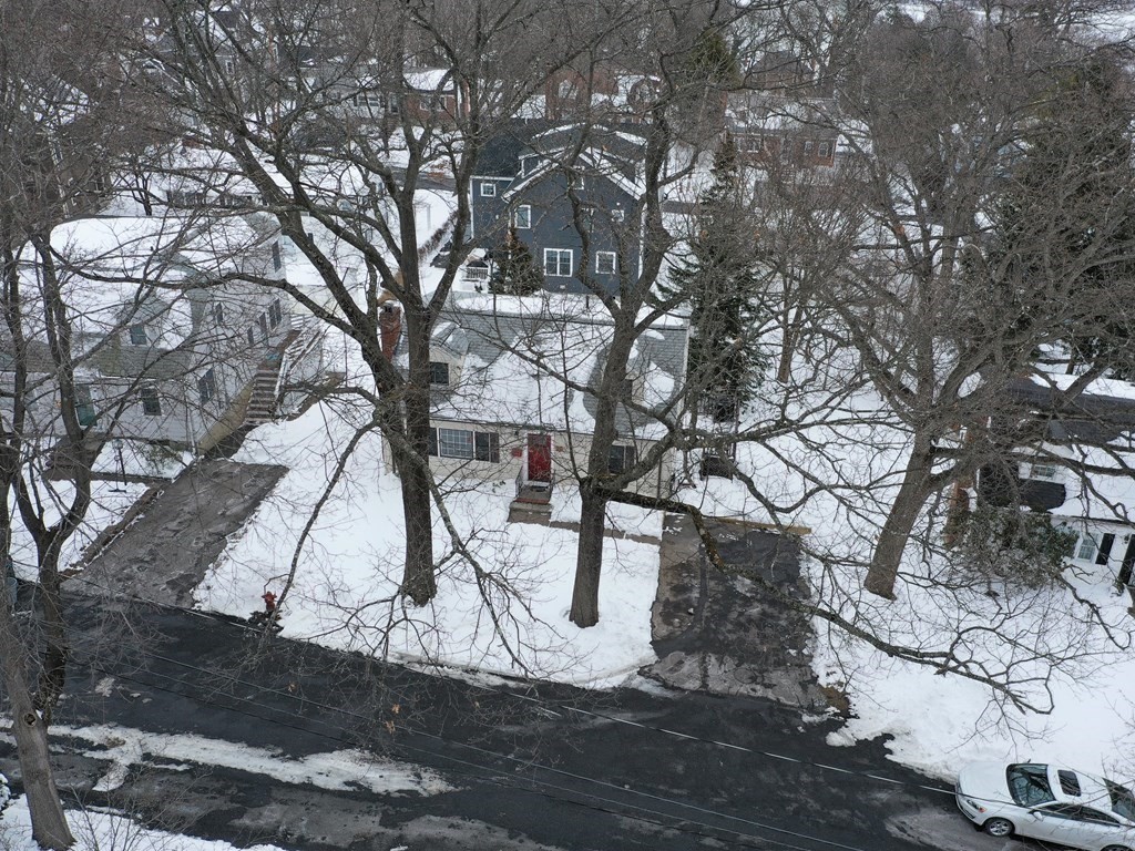 29 Baker Road Arlington, MA 02474 - Photo 3 of 36 a backyard of a house with lots of green space