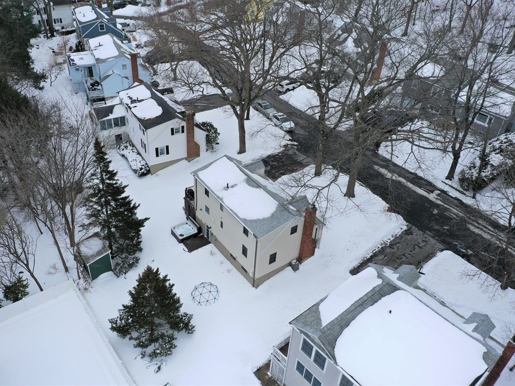 29 Baker Road Arlington, MA 02474 - Photo 33 of 36 an aerial view of a house with outdoor space