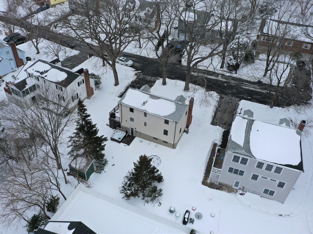 29 Baker Road Arlington, MA 02474 - Photo 34 of 36 an aerial view of a house with outdoor space
