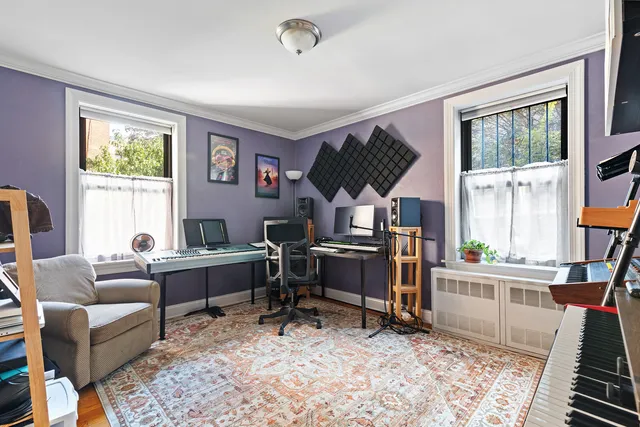 a living room with furniture and a window