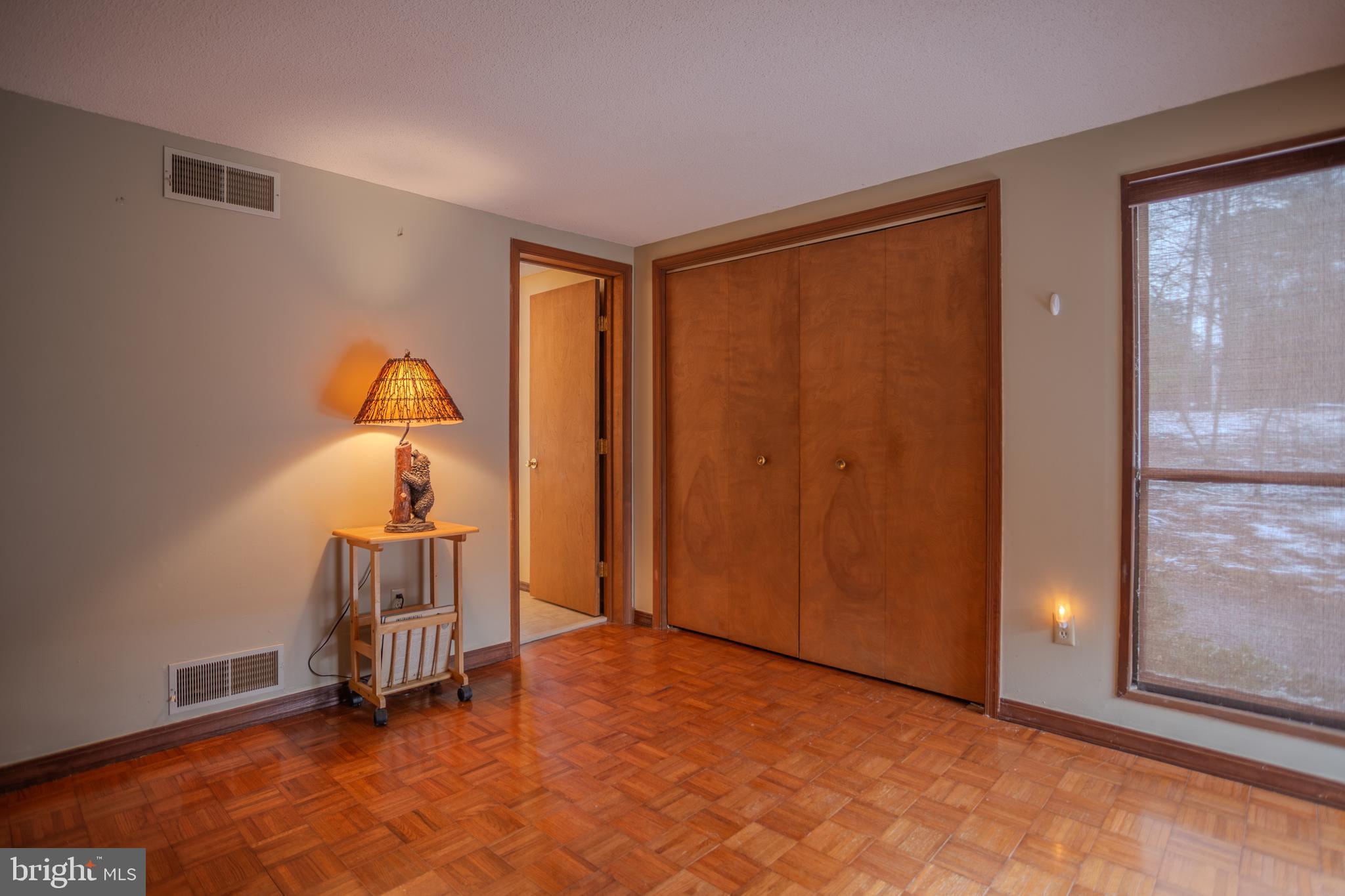 734 Walden Road Hedgesville, WV 25427 - Photo 27 of 65 Main level Bedroom 1 with Full bathroom