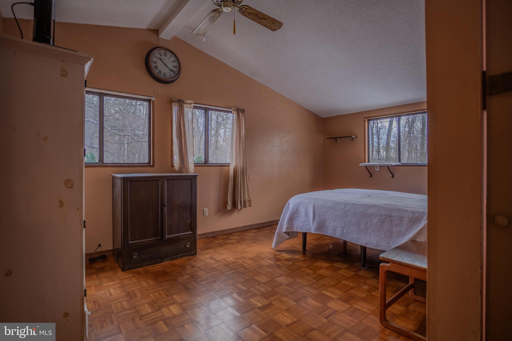 734 Walden Road Hedgesville, WV 25427 - Photo 38 of 65 Surrounded by windows and amongst the trees