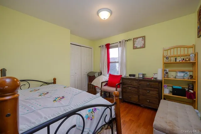 a bedroom with a bed and furniture