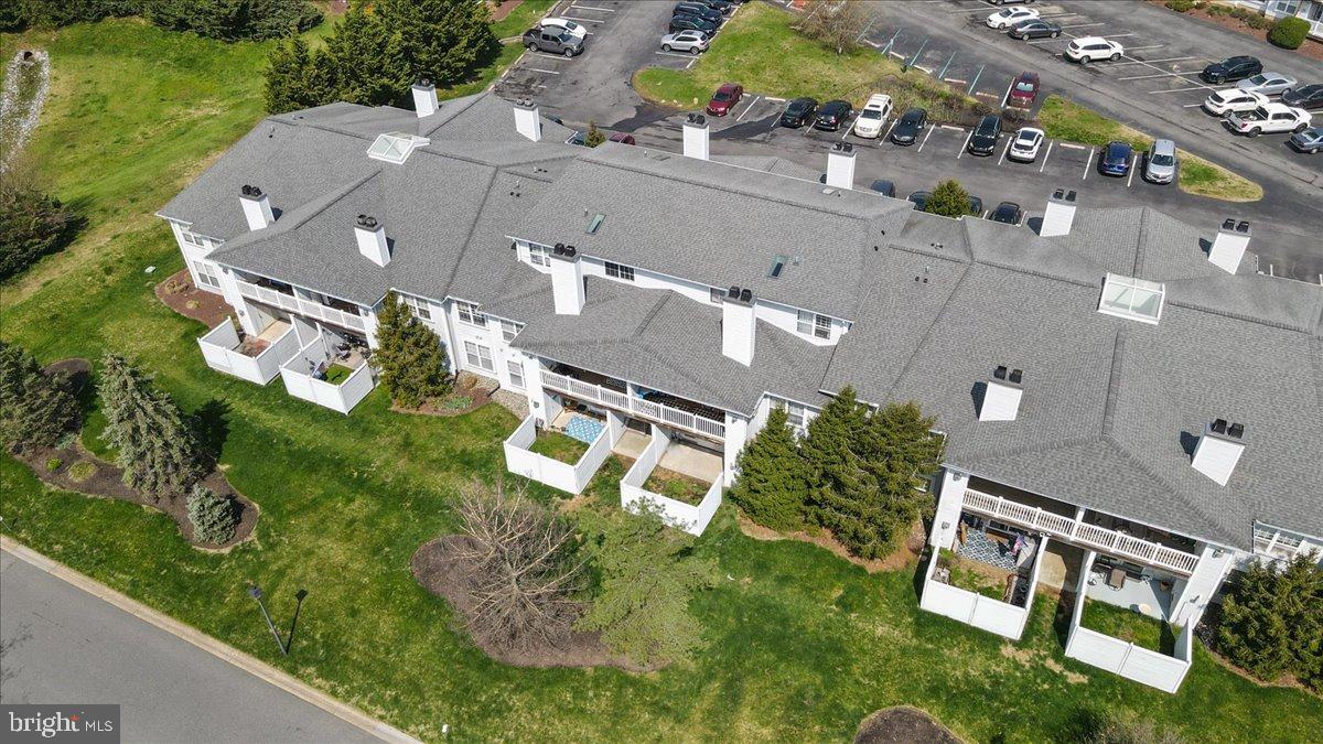 2702 Waters Edge Drive, Unit 2 Newark, DE 19702 - Photo 22 of 25 an aerial view of residential house with outdoor space and street view
