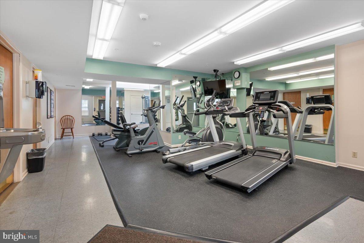 2702 Waters Edge Drive, Unit 2 Newark, DE 19702 - Photo 24 of 25 a view of a room with gym equipment