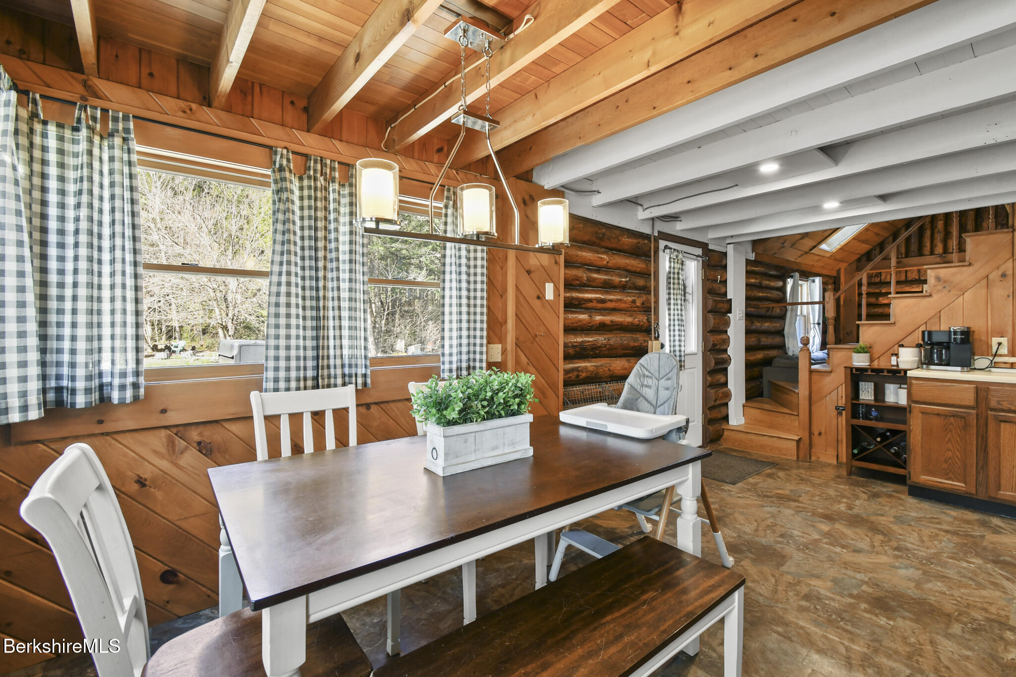 27 Shore Road Becket, MA 01223 - Photo 13 of 27 a view of a dining room with furniture window and outside view