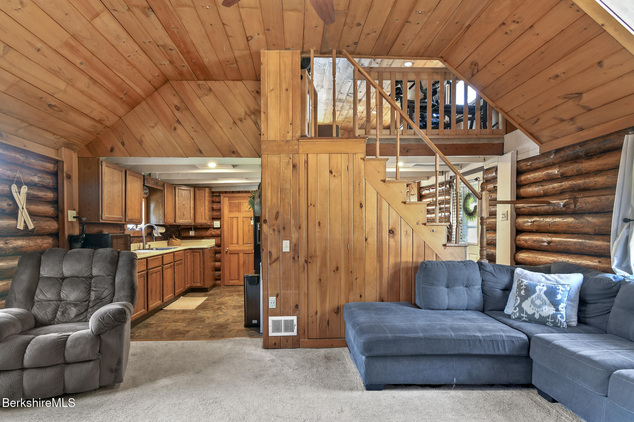 27 Shore Road Becket, MA 01223 - Photo 14 of 27 a living room with furniture and a kitchen view