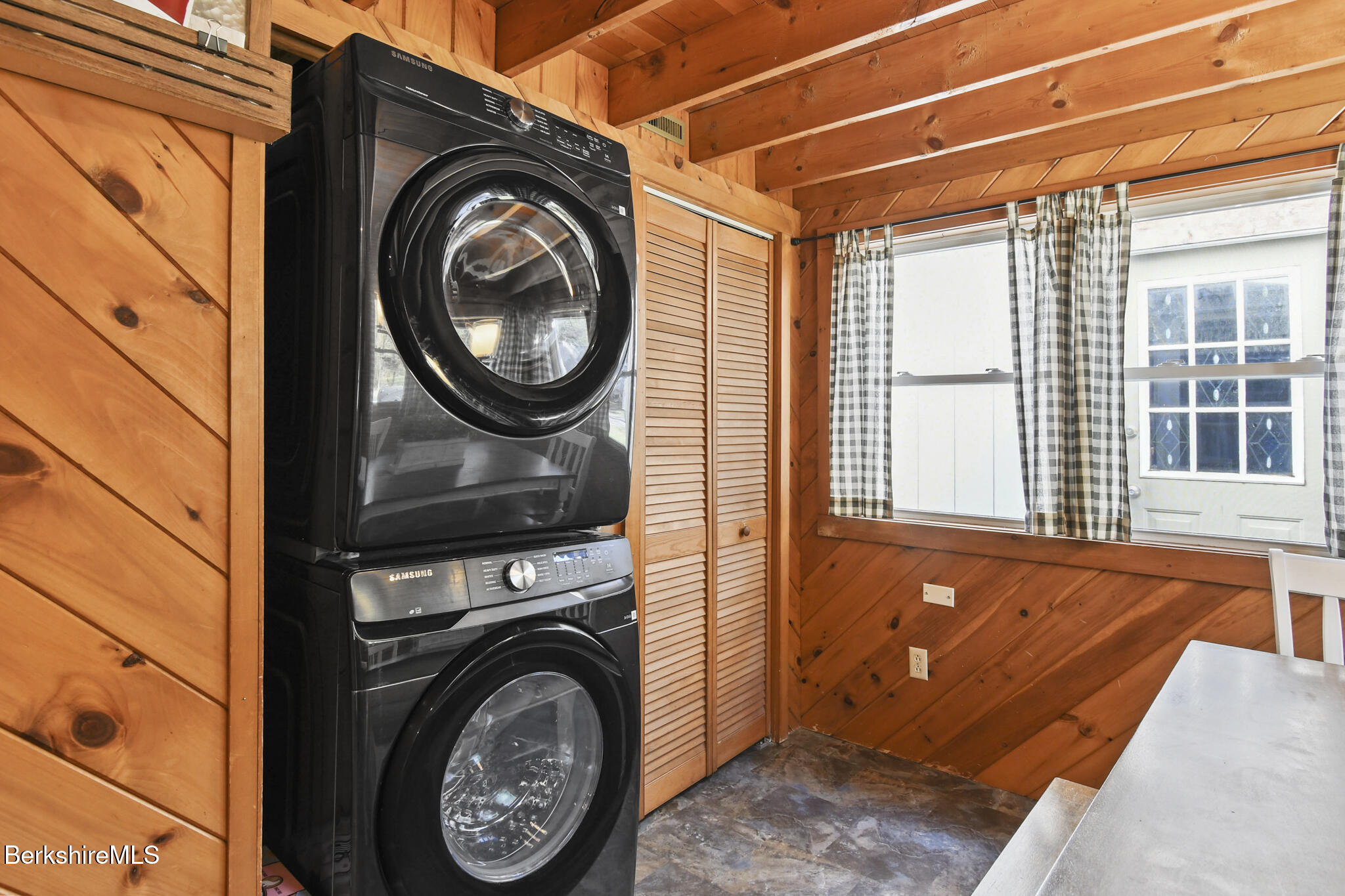 27 Shore Road Becket, MA 01223 - Photo 17 of 27 a view of a storage & utility room with a sink