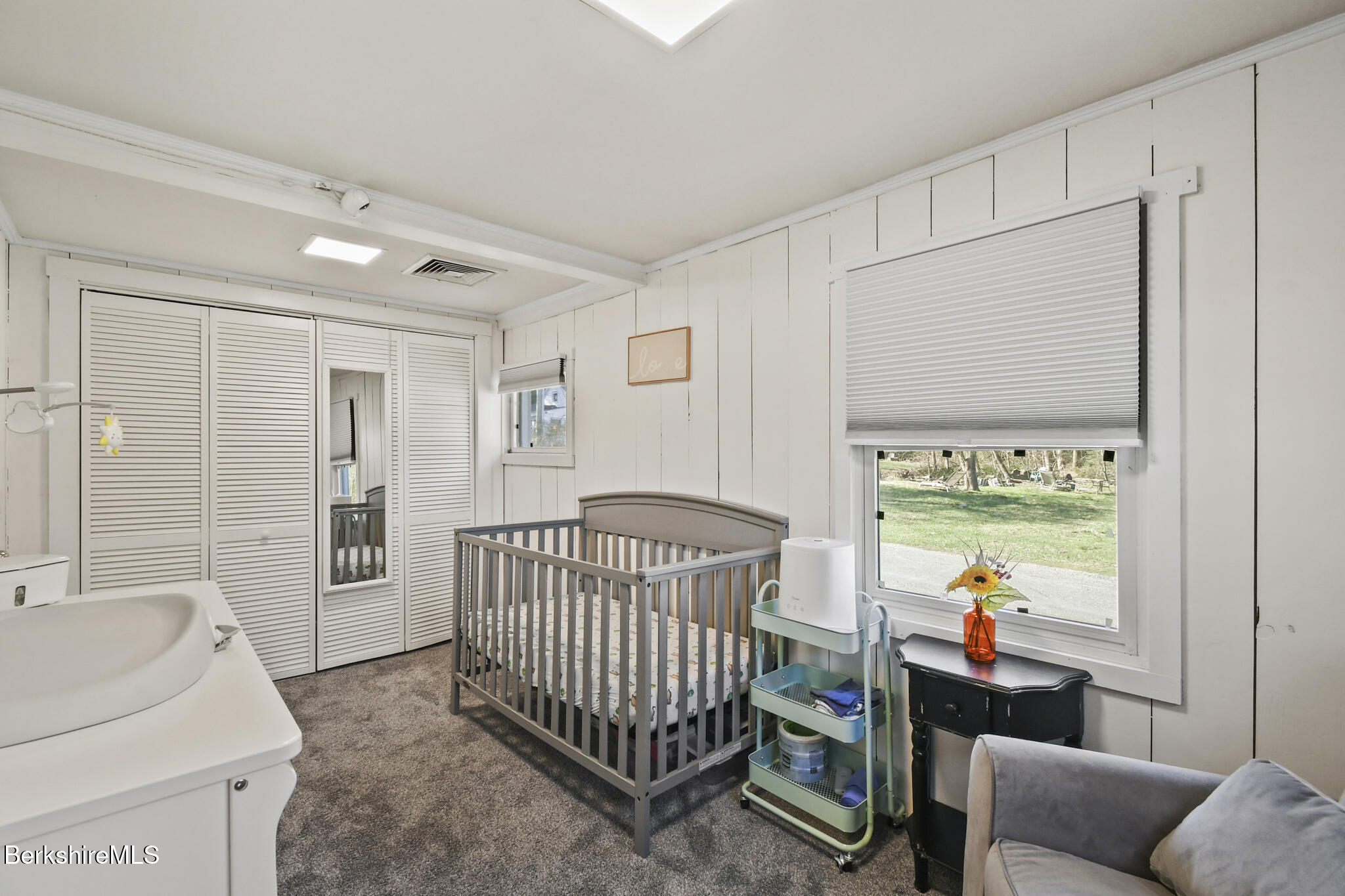 27 Shore Road Becket, MA 01223 - Photo 24 of 27 a bedroom with furniture and a window