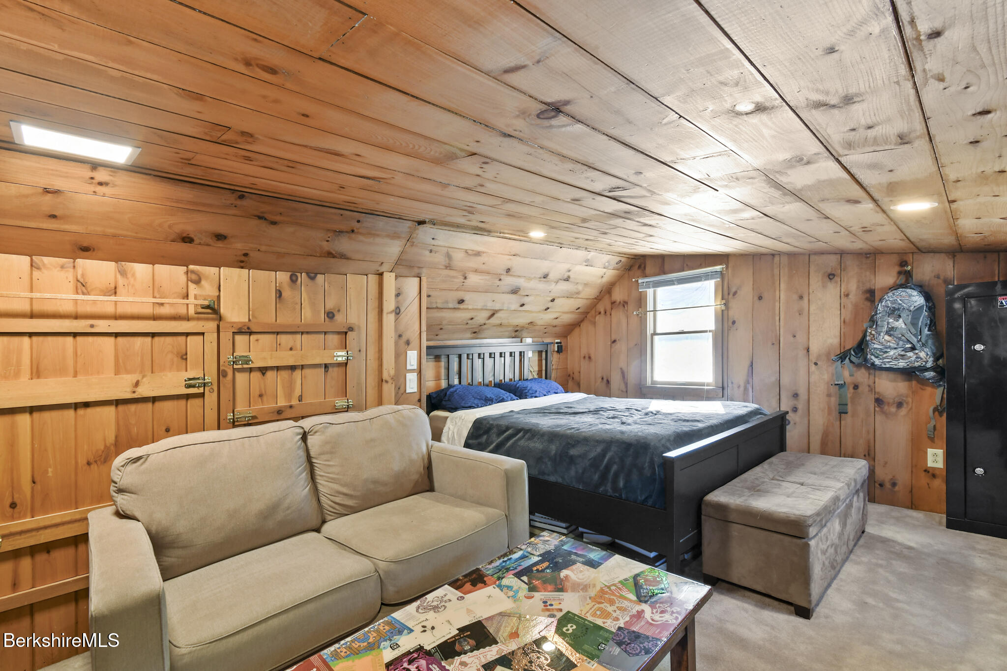 27 Shore Road Becket, MA 01223 - Photo 26 of 27 a bedroom with furniture and a window