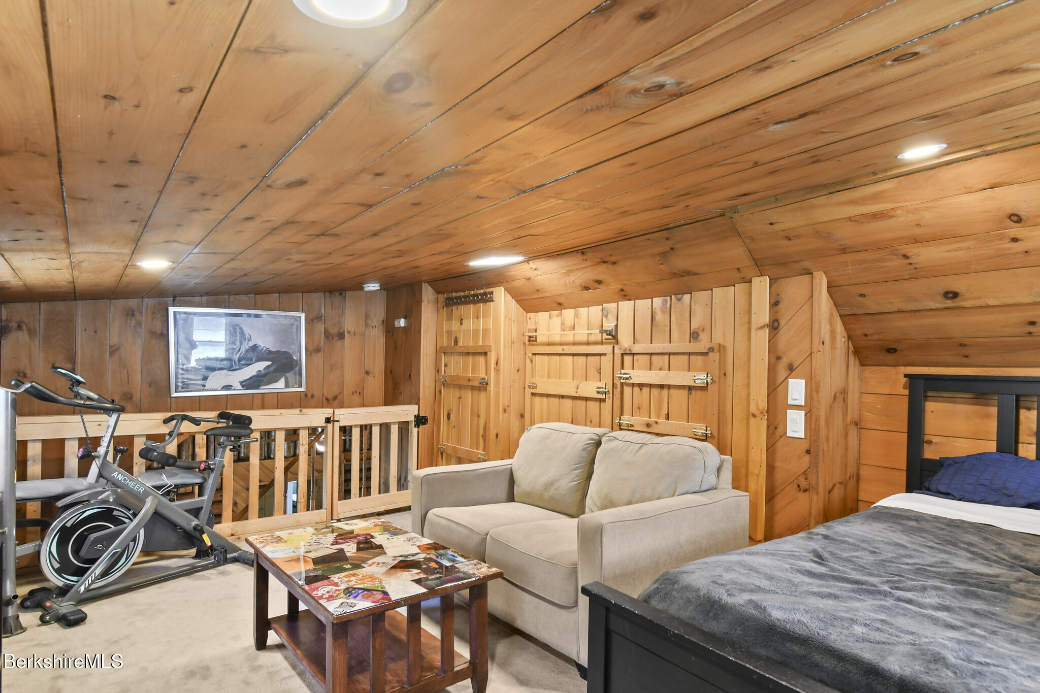 27 Shore Road Becket, MA 01223 - Photo 27 of 27 a bedroom with furniture and wooden floor
