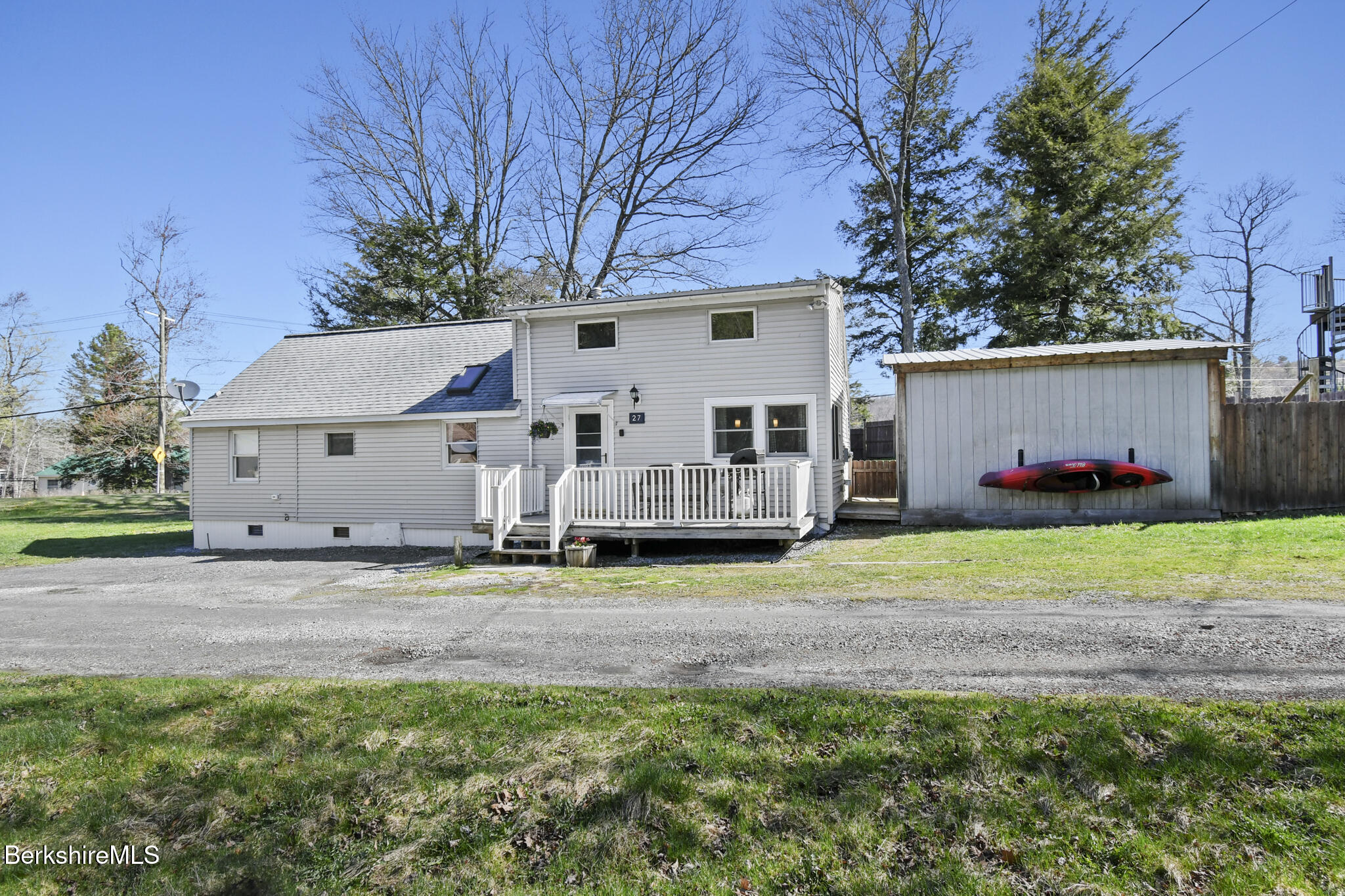 27 Shore Road Becket, MA 01223 - Photo 3 of 27 a view of a house with backyard and trees