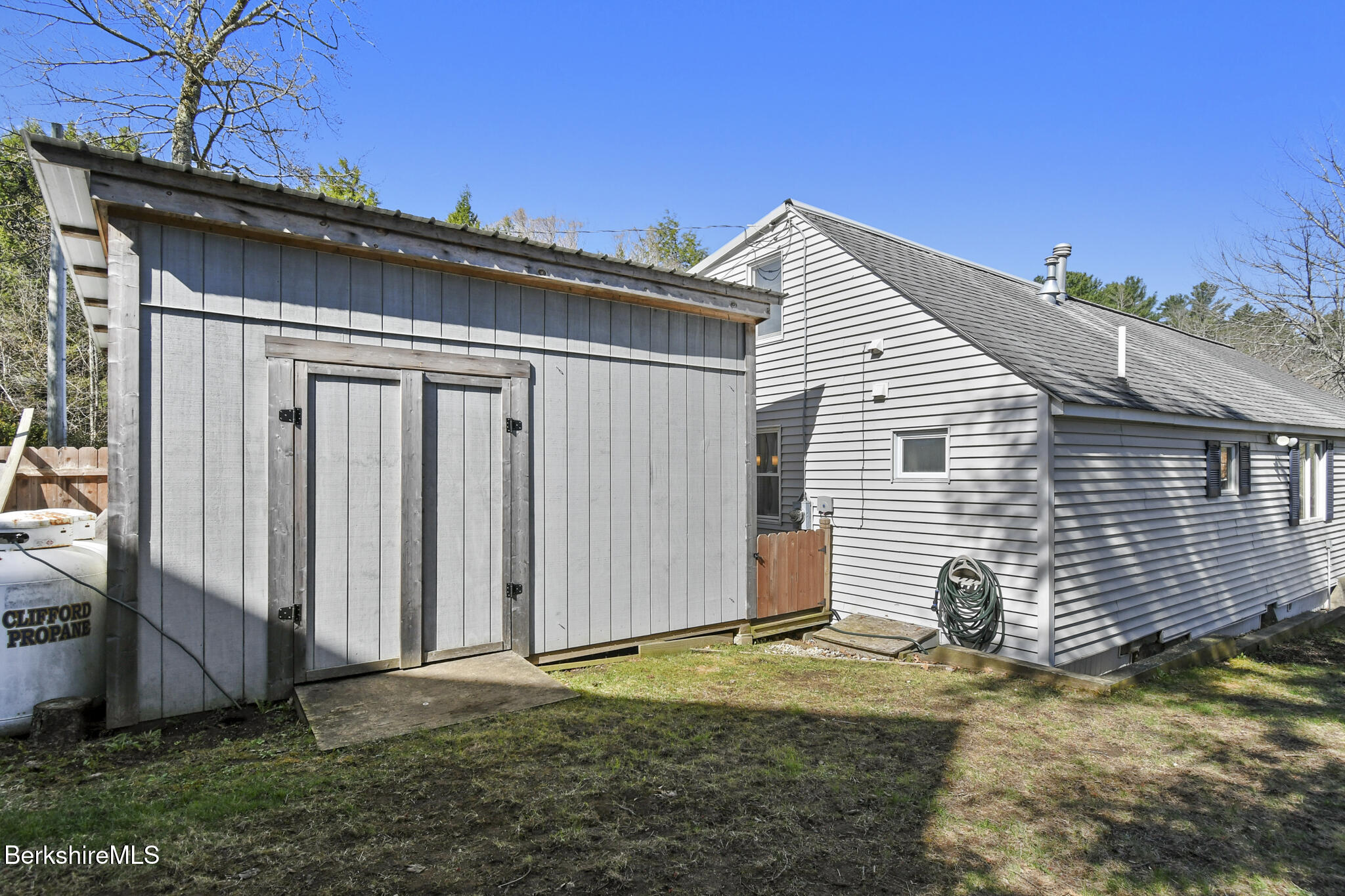 27 Shore Road Becket, MA 01223 - Photo 5 of 27 a view of backyard of house