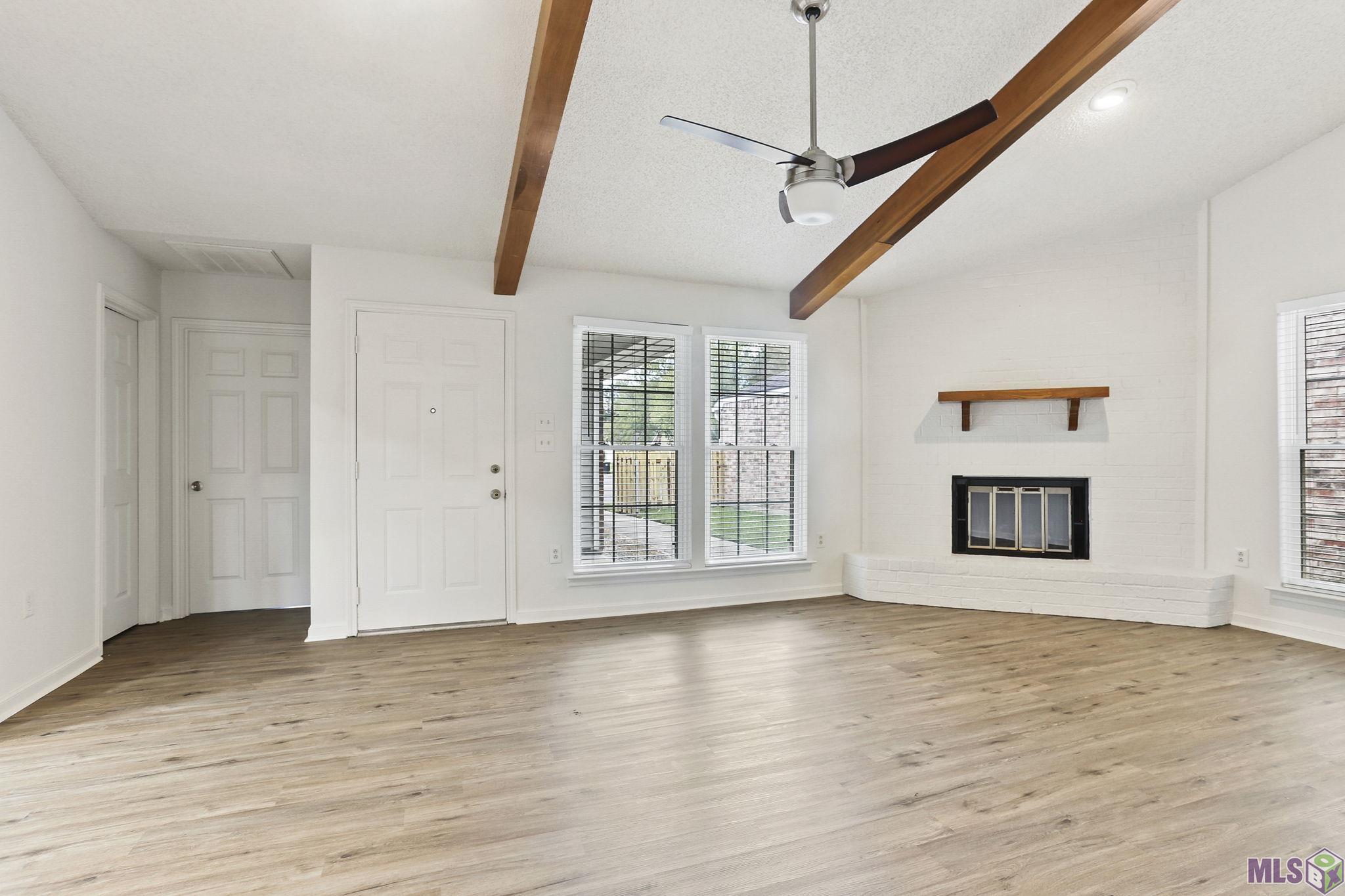 1454 Magnolia Ridge Drive Baton Rouge, LA 70816 - Photo 3 of 12 New flooring throughout the home