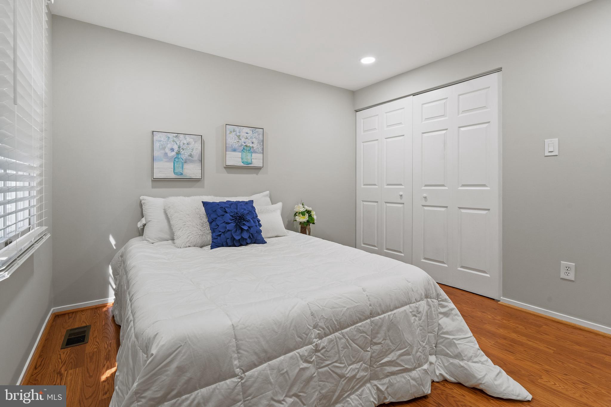 6122 Mantle Road Burke, VA 22015 - Photo 27 of 51 a bedroom with a bed and a window